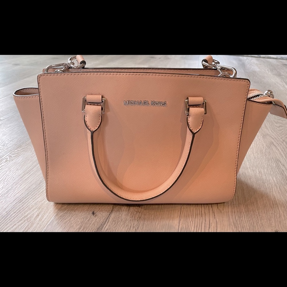 Nude pink Michael Kors handbag with removable cross body strap